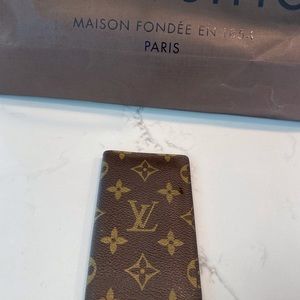 Louis Vuitton small book style wallet, receipt holder, etc